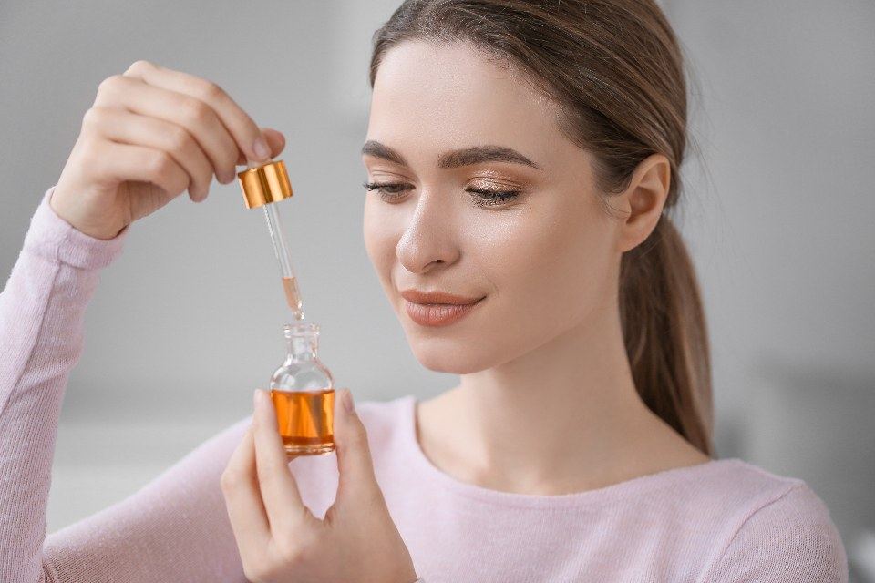 Skincare routine with a serum dropper